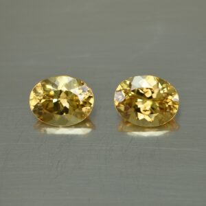 YellowZircon oval pair 9.6x7.5mm 6.99cts zn613