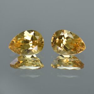 YellowZircon pear pair 10.6x7.6mm 7.28cts zn3220
