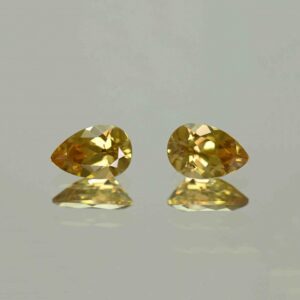 YellowZircon pear pair 9.0x6.0mm 3.95cts H zn3789 scaled 1