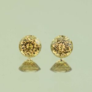 YellowZircon round pair 4.5mm 1.06cts H zn3817